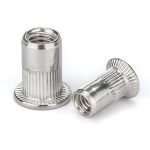 Rivet nut with knurled surface for secure fastening in metal applications.